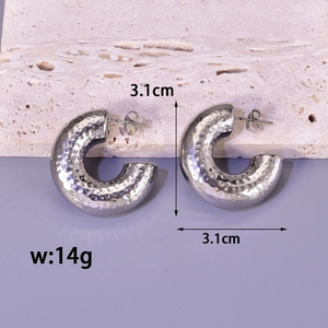 Detailed view of silver C-shaped earrings with hammer texture and 3.1cm size specs