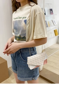 Pink and white patchwork crossbody bag with fine plaid flap and gold chain strap
