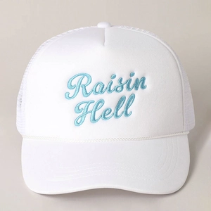 Detailed close-up of blue Raisin Hell embroidery and mesh texture on white trucker hat