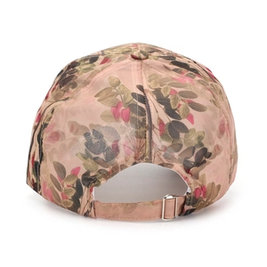 Rear view of floral print baseball cap featuring metal buckle and pink leaf pattern