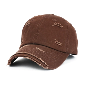 Distressed brown cotton baseball cap with vintage ripped details and frayed edge design
