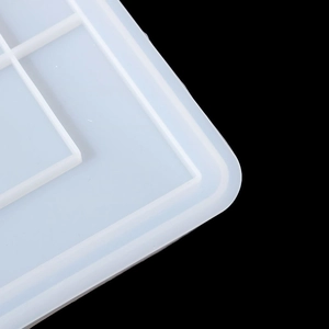 Macro detail of translucent silicone tray mold featuring reinforced grid structure
