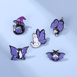 Five unique purple magic cat enamel pins with wizard hats and wings on blue background