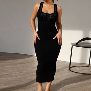 Detail of the sparkling rhinestone neckline on a black sleeveless bodycon midi dress