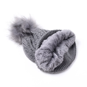 Women's winter grey knit beanie with faux fur pompom and warm fleece lining detail