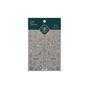 European vintage gold nail stickers with ornate floral patterns on gray base paper M-629