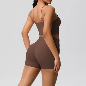 Detailed back view of a chocolate brown seamless yoga set with thin straps and high waist shorts