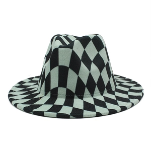 Detailed macro view of the checkered pattern on a wool fedora jazz hat with center dent