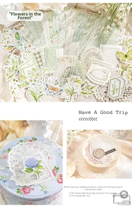 Detail of vintage floral scrapbooking stickers and lace paper for DIY journals