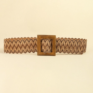 Detail of woven straw belt texture with square wooden buckle and wavy herringbone pattern