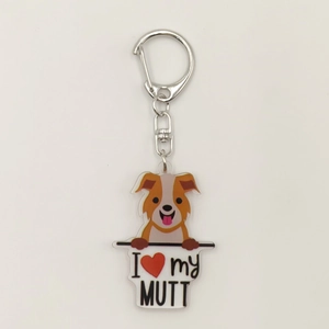 Detail of acrylic cartoon dog keychain featuring I Love My Mutt text and metal hardware