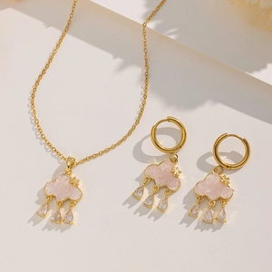 Pink cloud necklace and earring set with star charms and dangling zircon tassels in gold