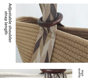 Detail showing adjustable woven shoulder strap with geometric pattern and wooden ring