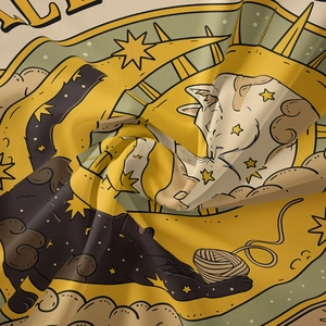 Macro detail of high-quality woven tapestry fabric with black cat and star moon patterns
