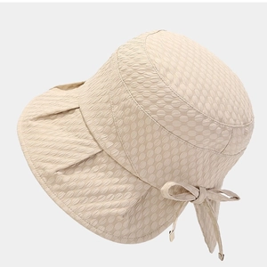 Beige bubble texture sun hat with elegant bow tie detail for summer sun protection