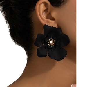 Artistic matte black oversized flower earrings with golden petal core for women
