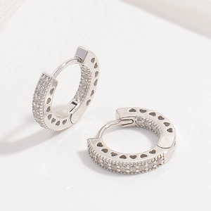 S925 sterling silver hoop earrings with clear crystals and hollow heart cutouts