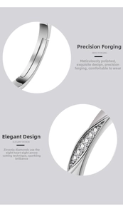 Detailed macro view of silver Mobius ring featuring precision heart and arrow cut zircon