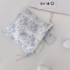 Detail of floral bear drawstring bag with smooth texture and cute cartoon pattern