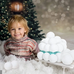 Close-up of soft white artificial snowballs for Christmas tree decoration and kids indoor play