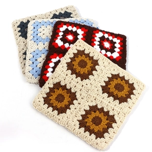 Handmade crochet cat ear beanie with colorful grandmother square patterns for winter