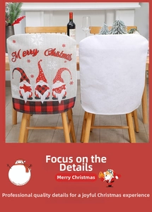 Detail of burlap Christmas chair cover featuring three gnomes and Merry Christmas text