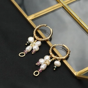 Baroque hoop earrings with gold-tone metal and irregular white pearls in vintage style