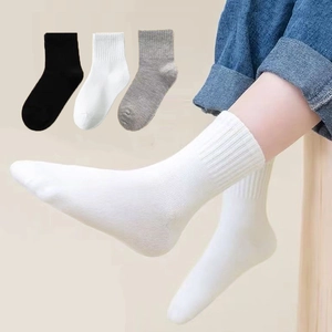 Minimalist solid color cotton sports socks for kids in black white and gray 3-pack
