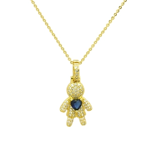 Detailed close-up of a gold necklace pendant featuring a boy figure and a blue heart zircon