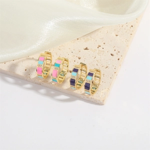 Chic gold hoop earrings with colorful enamel and sparkling cubic zirconia on stone base
