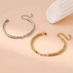 Minimalist stainless steel wave pendant bead bracelet in gold and silver finish