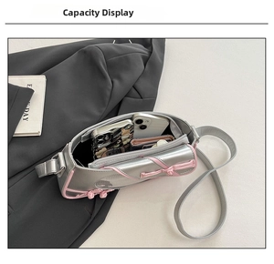 Detailed interior capacity showing space for phone and wallet in pink crossbody bag