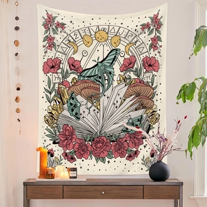 Detail of bohemian tapestry featuring luna moth, mushrooms, and mystical alchemy symbols