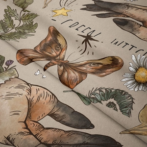 Close-up of Bohemian tapestry fabric showing macro detail of moth and star print