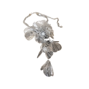 Silver multi-layer choker with large hollow flower charms and layered tassel chains