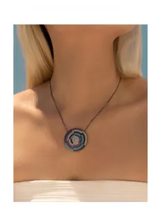 Close-up of S925 silver pixel-style shield necklace with colorful inlaid crystals