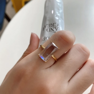 Minimalist 925 sterling silver ring with rectangular zircon stone on woman hand