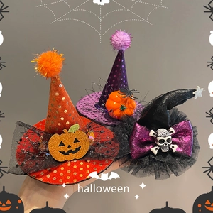 Three Halloween mini witch hat hair clips featuring pumpkins, spiders, and skulls