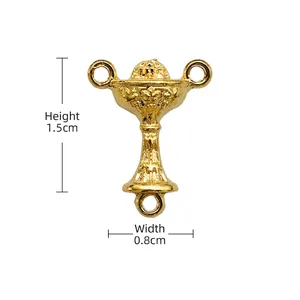 Detail of a 1.5cm golden chalice-shaped jewelry connector with 3-way hanging loops
