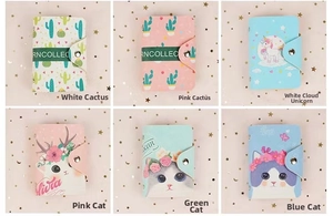 Detail view showing six colorful PU leather card holders with diverse cartoon patterns
