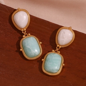 Detailed close-up of 18K gold-plated earrings with natural amazonite and white stone