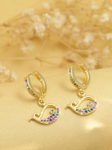 Detailed view of golden whale earrings with vibrant colorful cubic zirconia inlay