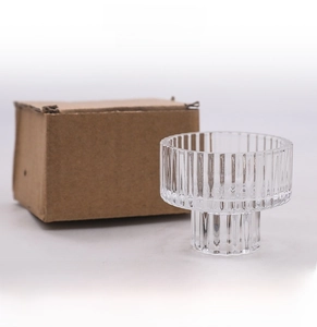 Pink striped glass candle holder in protective thick corrugated cardboard packaging box