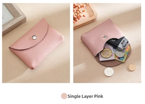 Pink pebbled leather mini wallet showing internal card slots and car key storage