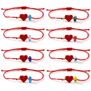 Otto bracciali a cuore intrecciati rossi con perline malocchio e design regolabile