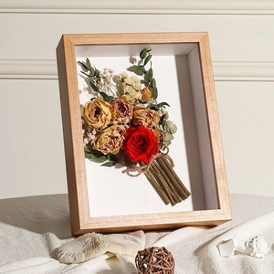 3D hollow wooden shadow box frame with dried flowers and natural wood texture
