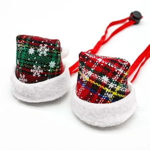Christmas pet hats in red and green plaid with snowflakes and adjustable elastic straps