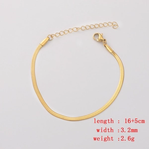 Detail of gold snake bone chain bracelet with lobster clasp and adjustable extension link