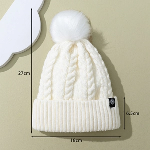 Winter white knit beanie with fleece lining, snowflake patch and size measurement 27x18cm