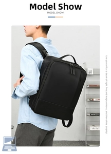 Front view of black minimalist business laptop backpack worn by a model in studio